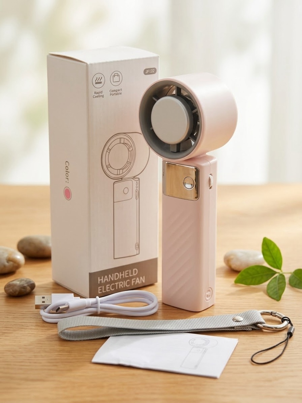 Compact Pink Handheld Electric Fan – Portable Personal Cooling